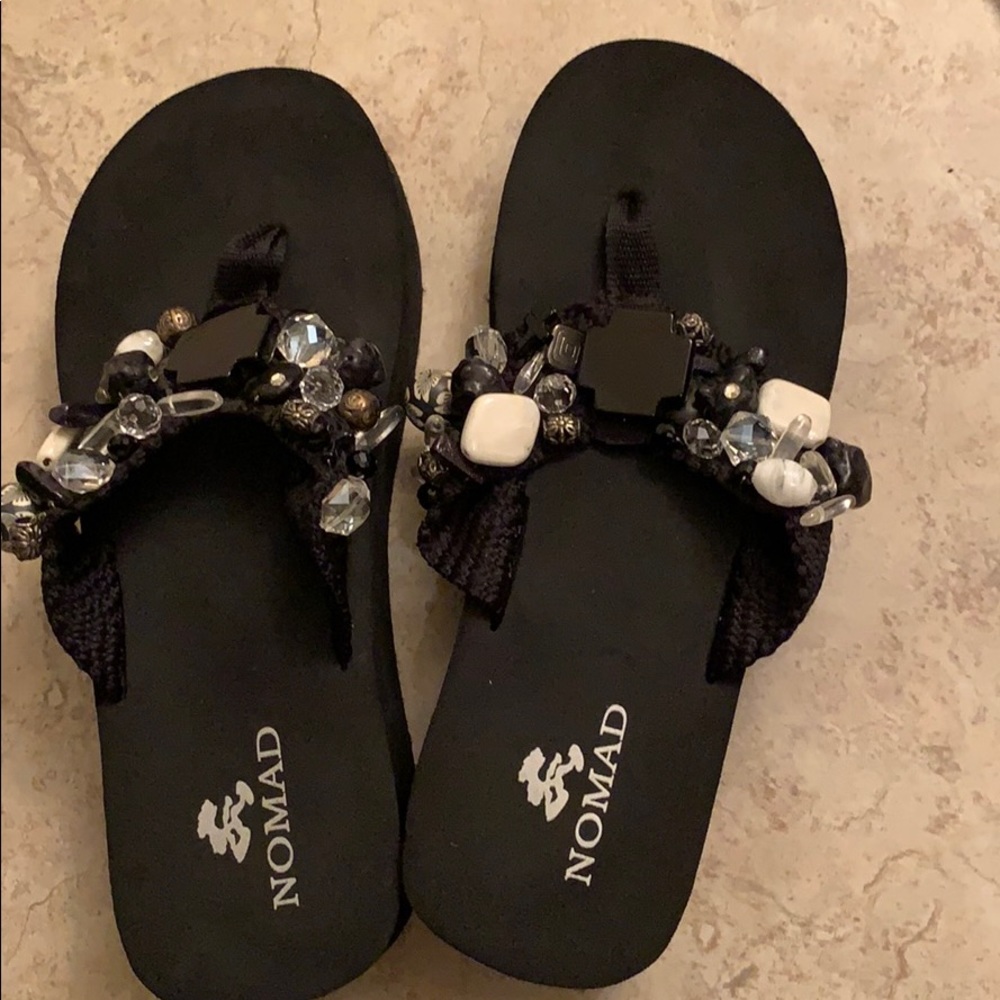 Women’s Nomad flip flops